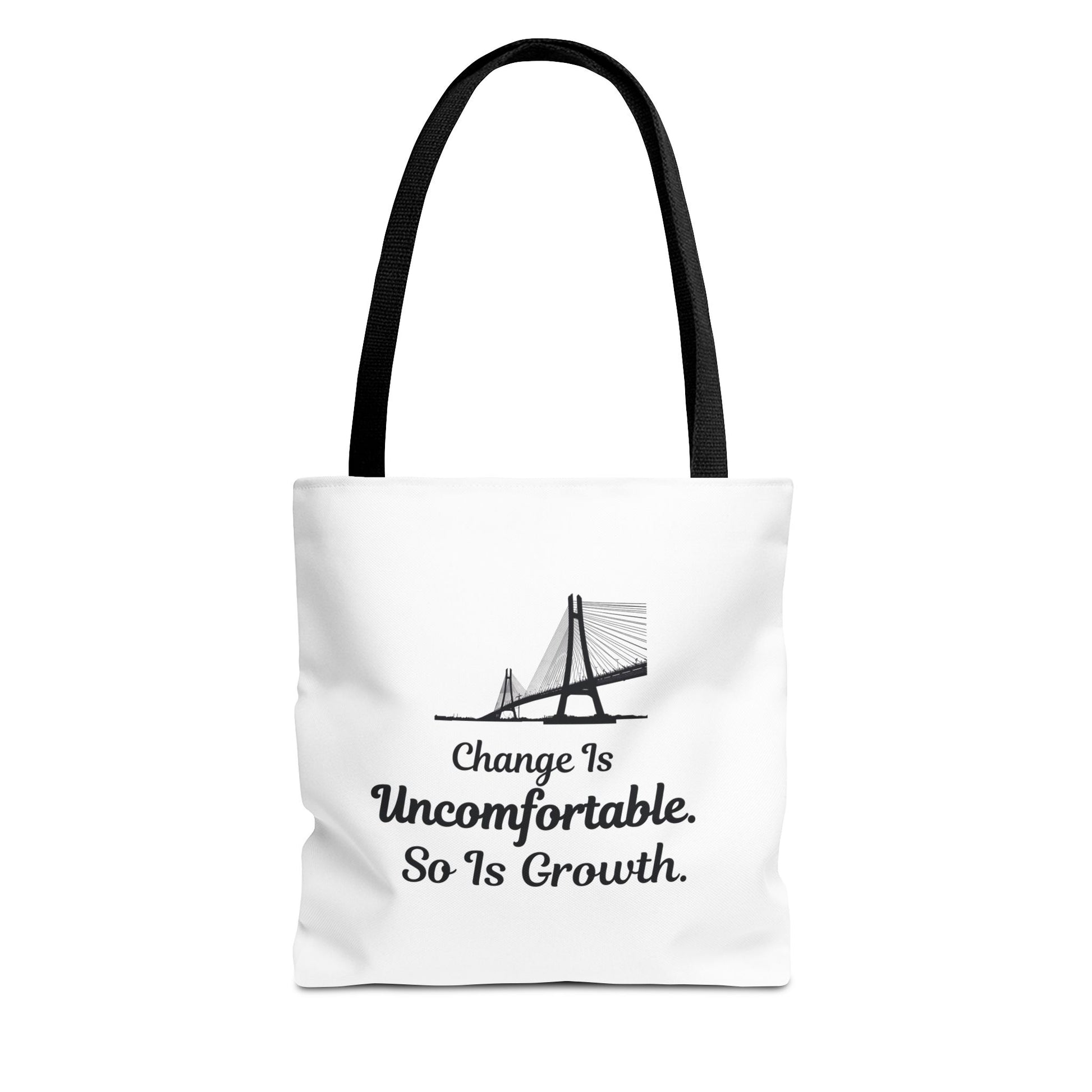 White tote bag with black handle, featuring the text 'Change Is Uncomfortable. So Is Growth' and a bridge graphic on a white background