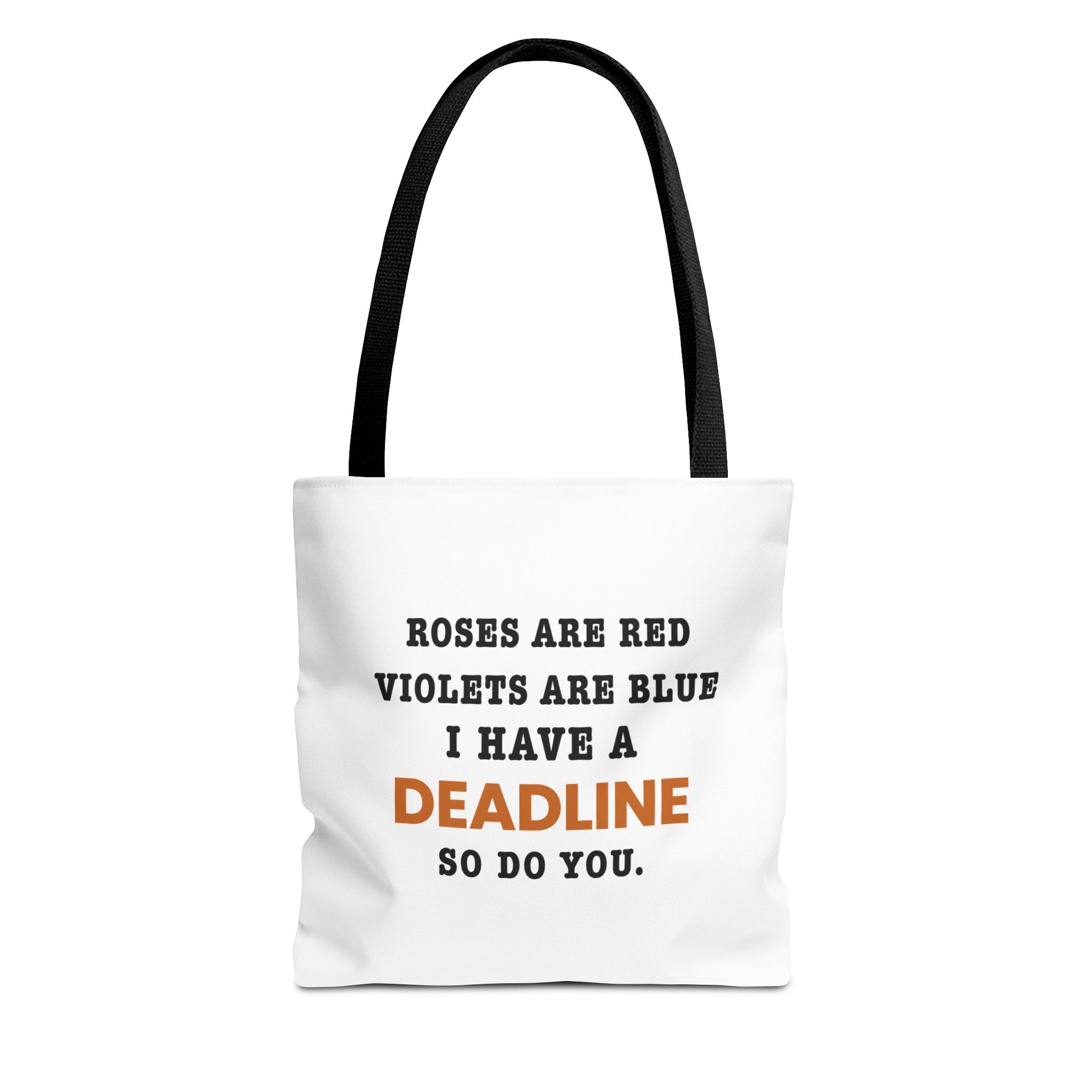 Tote bag with black handles and text 'Roes are red, violets are blue. I have a deadline so you do' on a white background