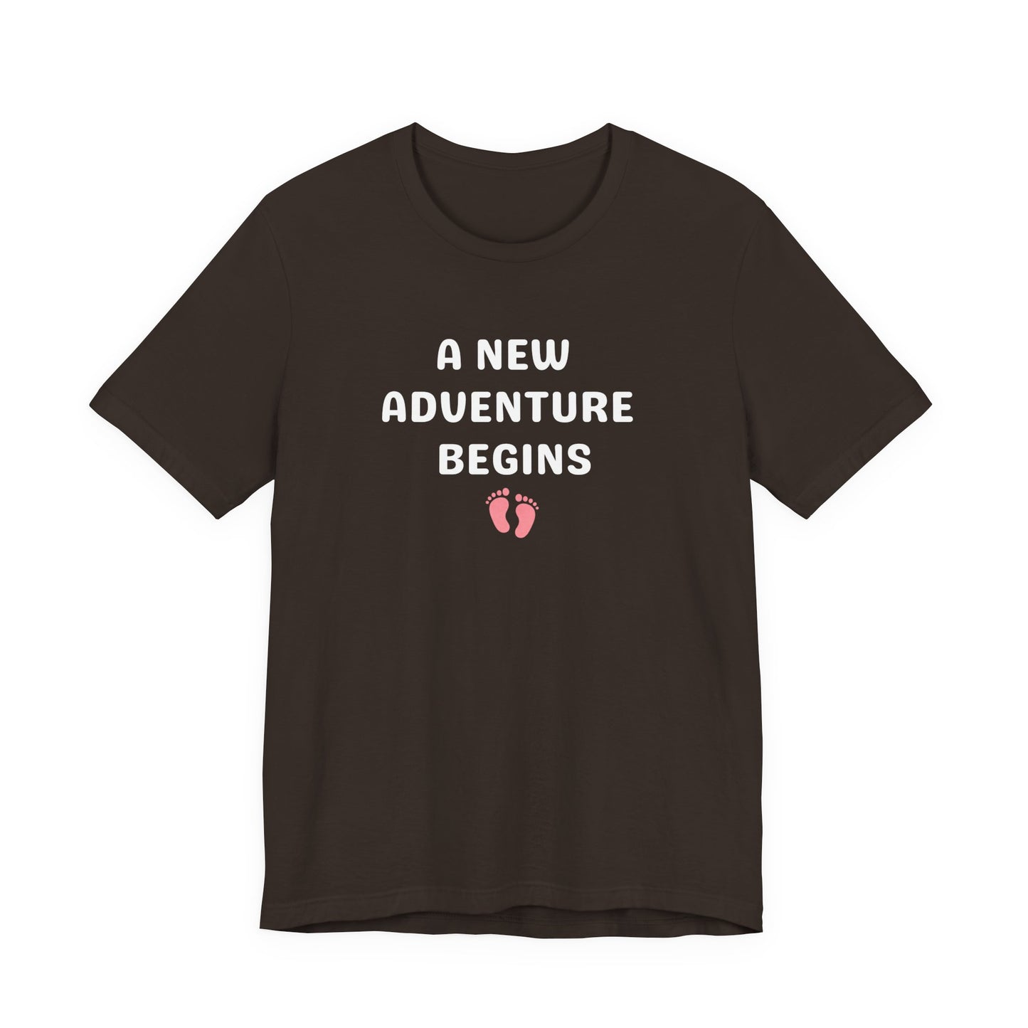 Black t-shirt with 'A New Adventure Begins' text and footprints on a white background