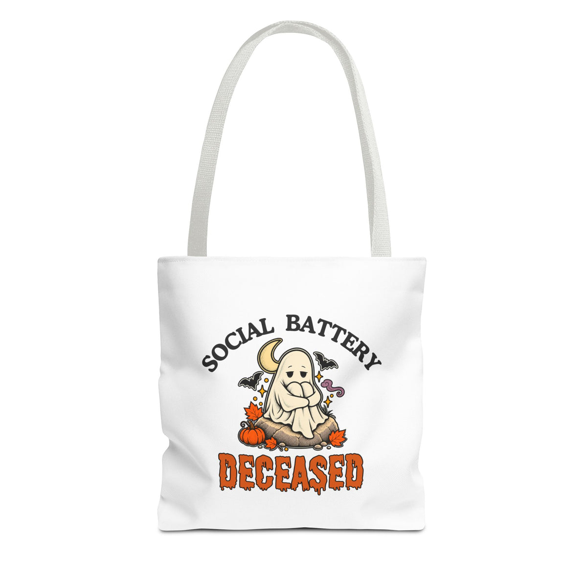 A white tote bag with white handles, featuring a 'Social Battery: Deceased' graphic with a ghost sitting on a rock