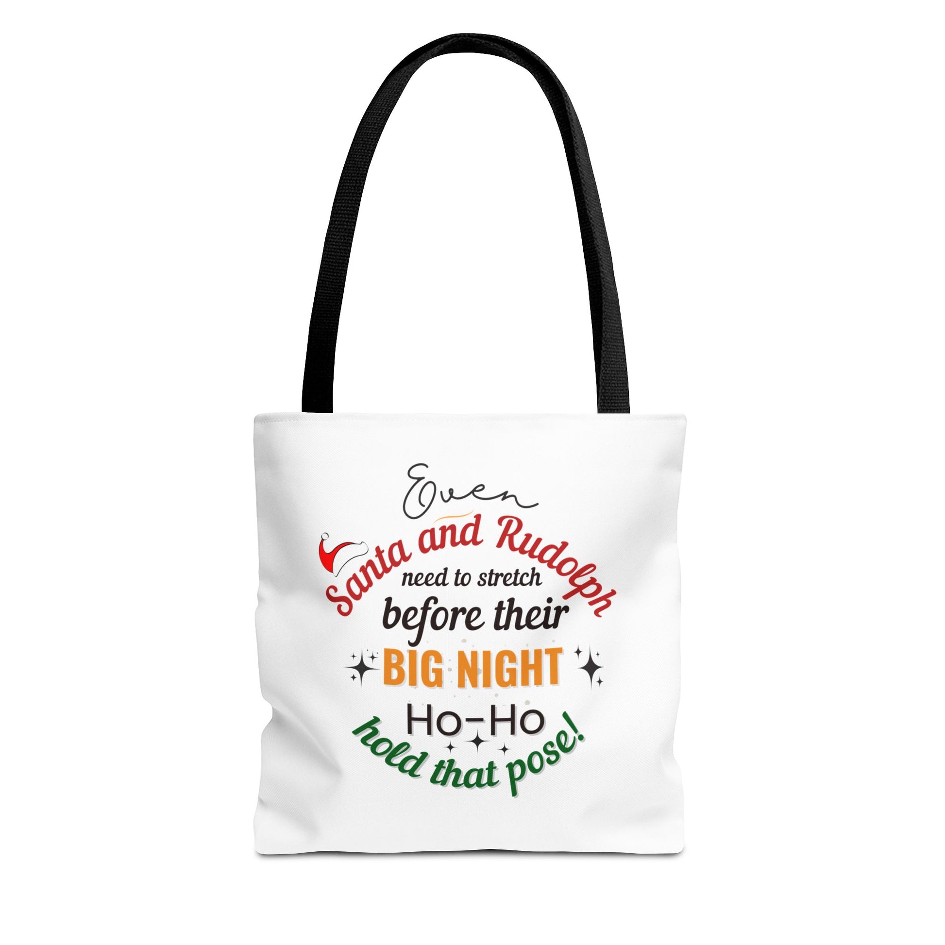 White tote bag with black handle and text 'Event Santa & Rudolph Need to Stretch Before their Big Night. Ho-Ho-Hold That Pose!' on a white background