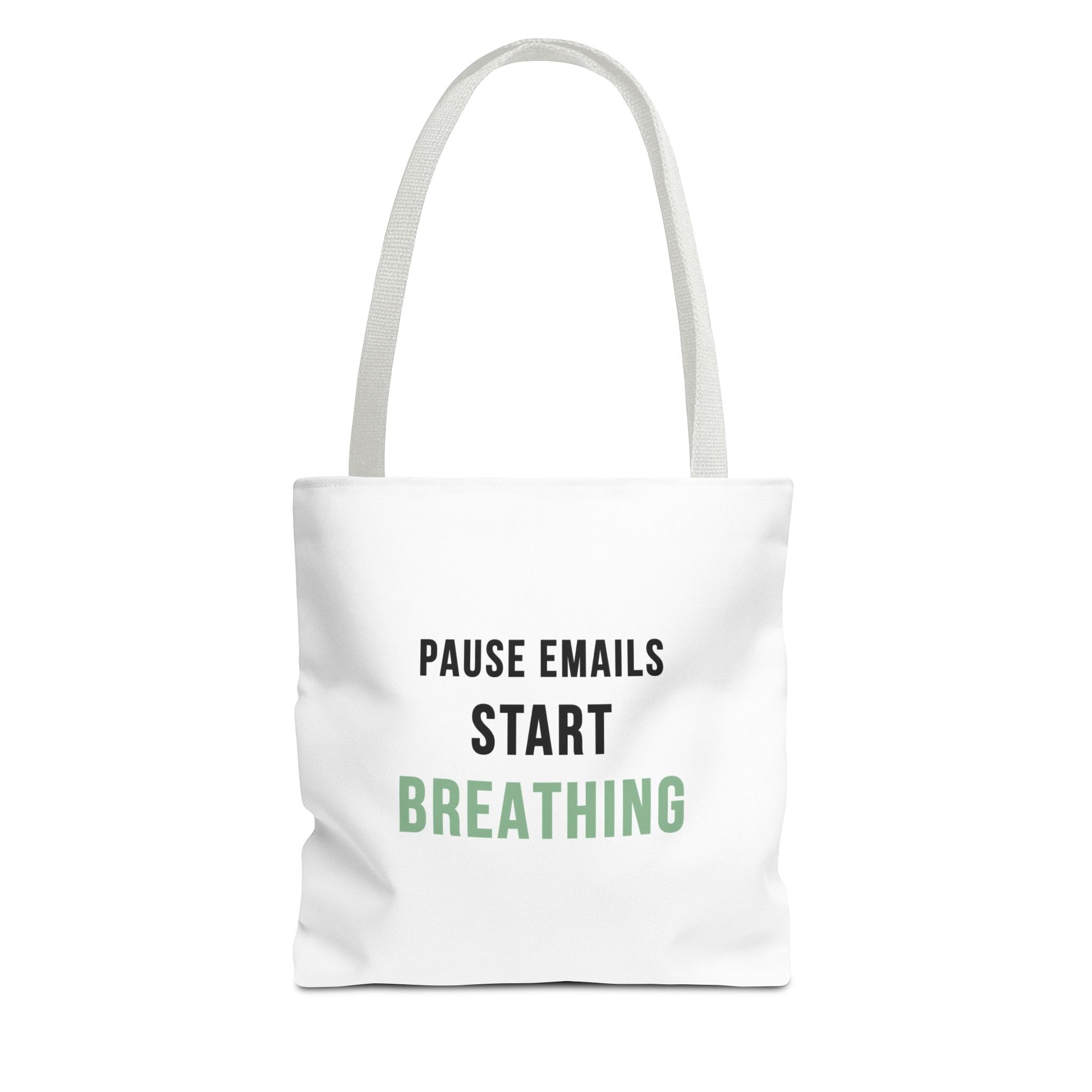 White tote bag with white handles and text 'Pause Emails, Start Breathing' on a white background