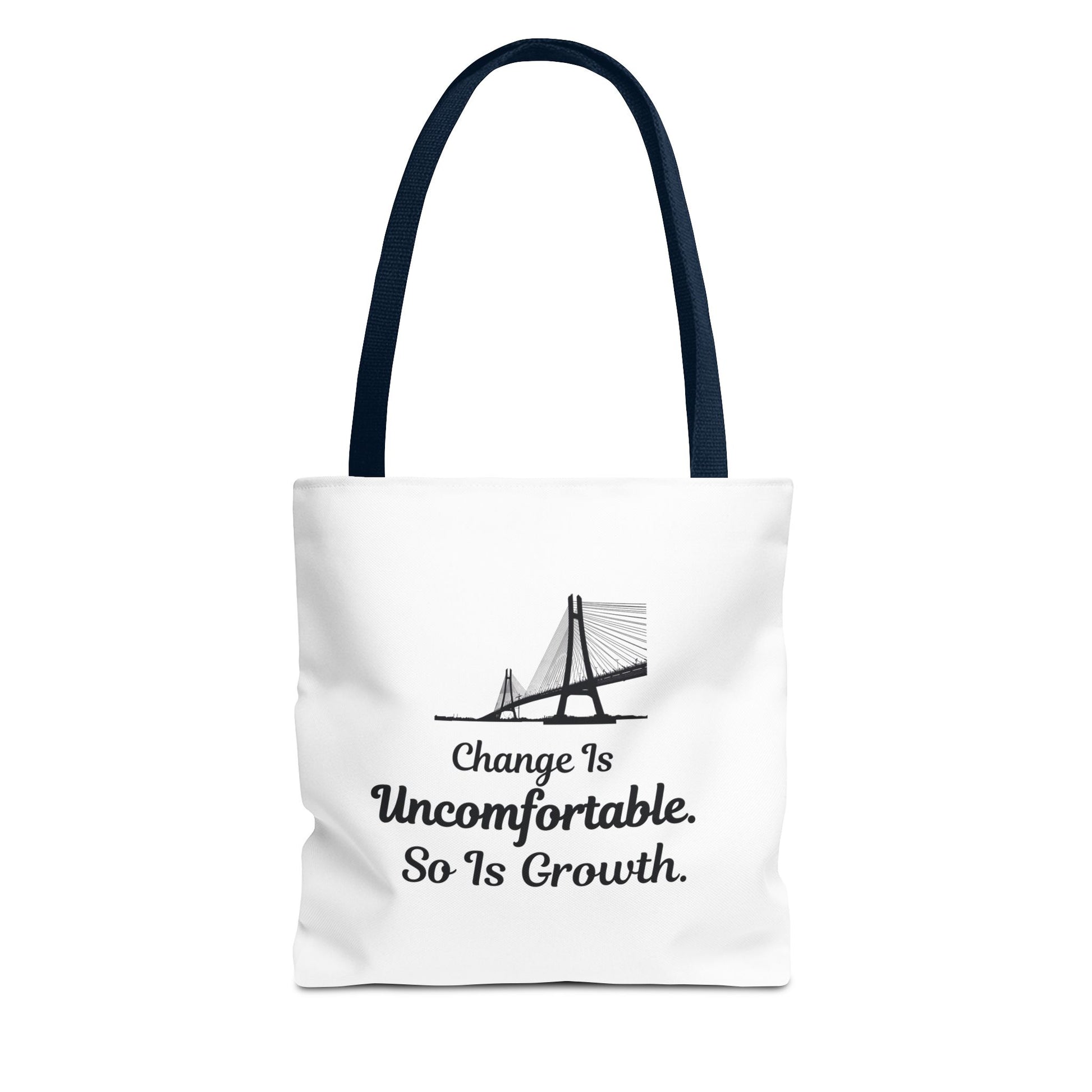 White tote bag with navy handle, featuring the text 'Change Is Uncomfortable. So Is Growth' and a bridge graphic on a white background