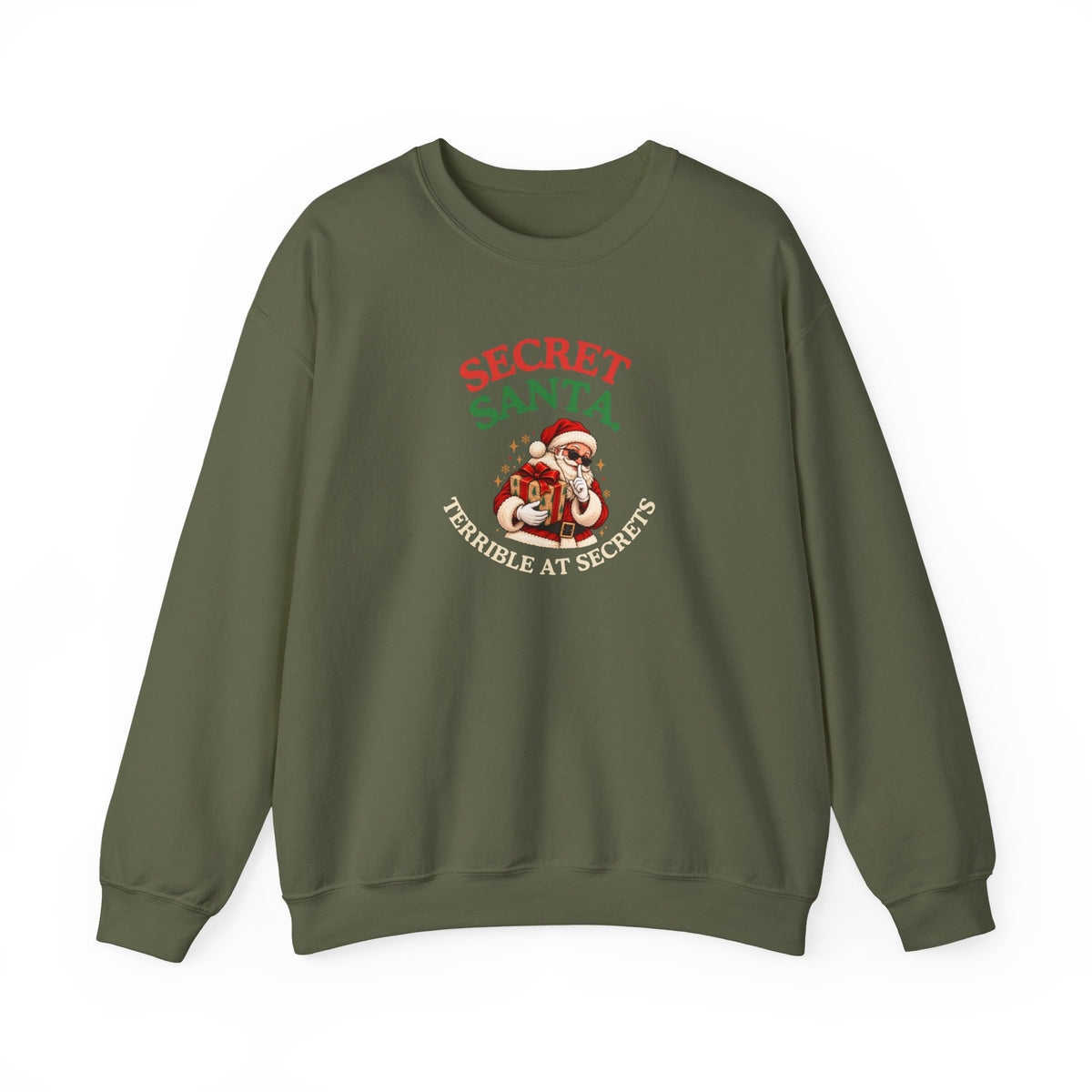 A military green sweatshirt featuring the text 'Secret Santa. Terrible at Secrets.' with a Santa illustration
