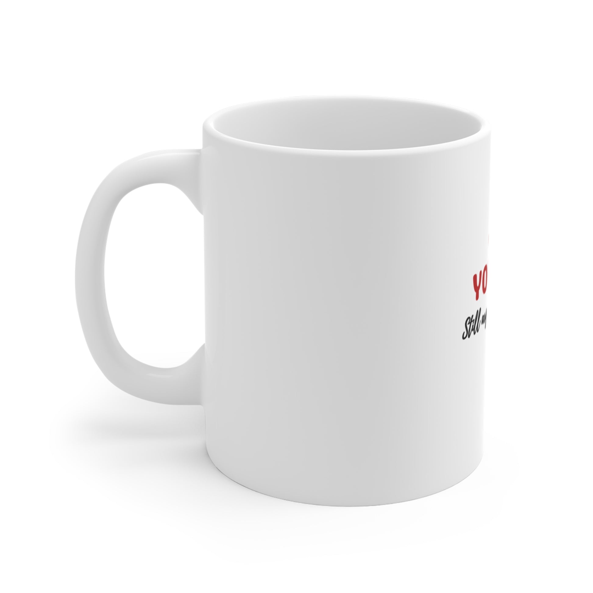 Left side of a white mug with text 'YOU & ME. Still arguing. Still choosing.' on a white background