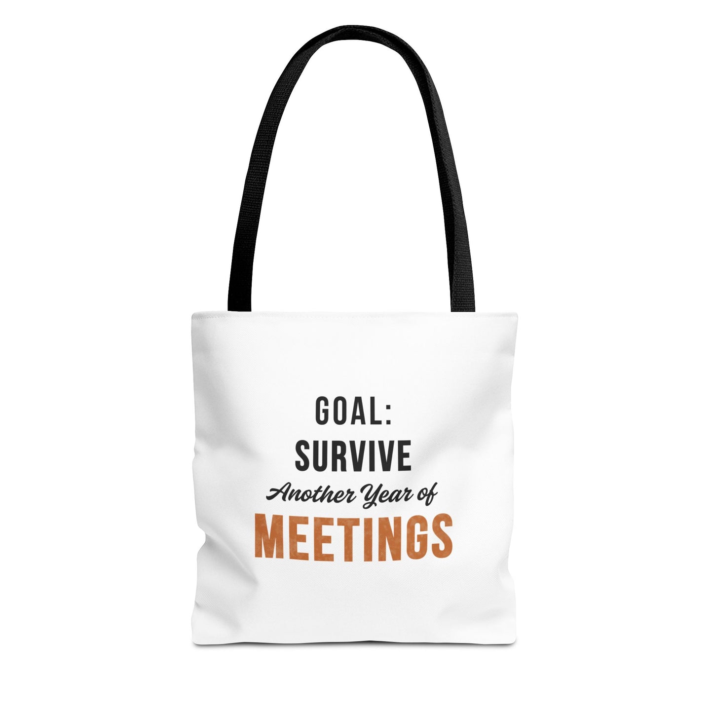 Tote bag with black handles and text 'Goal: Survive Another Year of Meetings' on a white background
