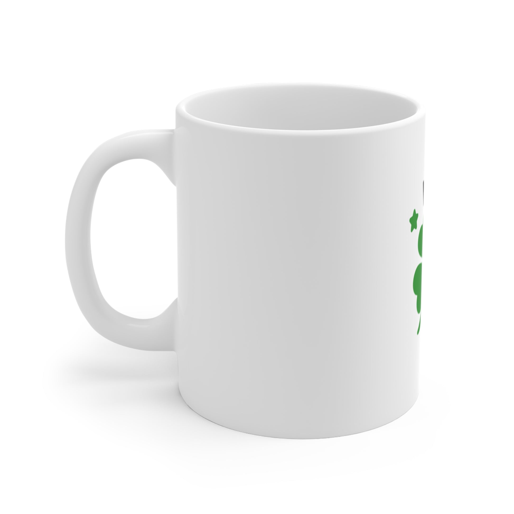 Left side of a white mug with green four-leaf clover and 'Lucky Me' text on a white background