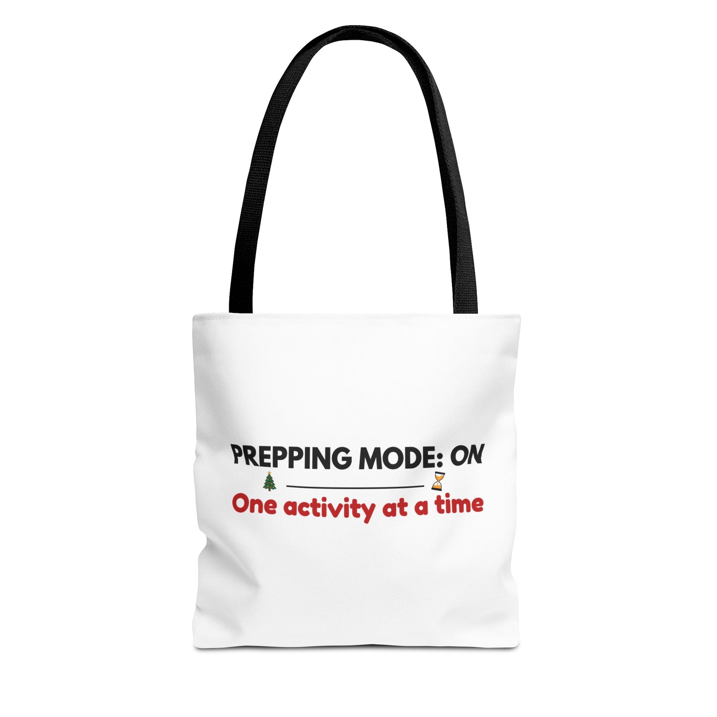 White tote bag with black handle featuring humorous text 'Prepping Mode: ON – One activity at a time' on a white background