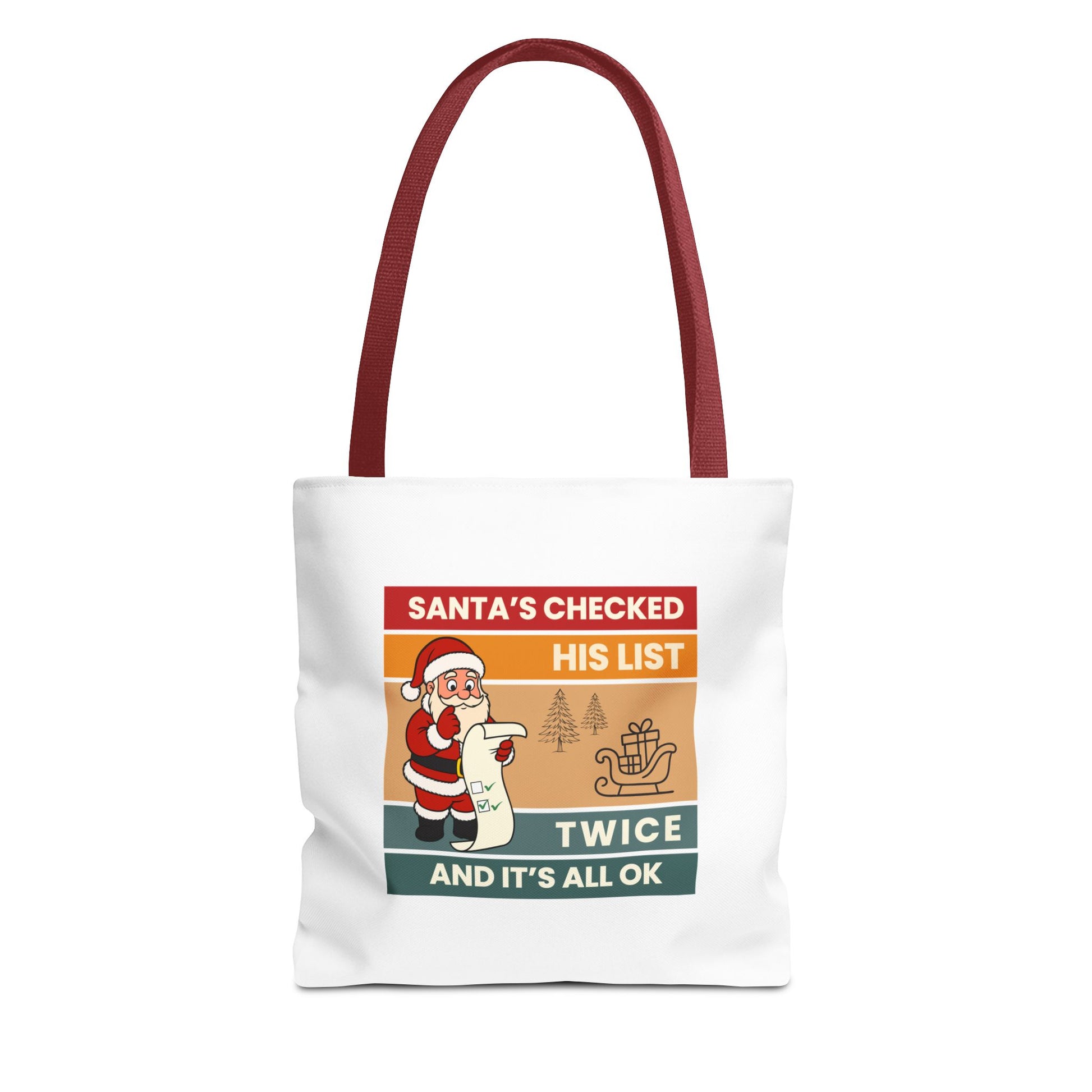 Tote bag with red handle and text 'Santa's Checked His List Twice And It's All Ok' on a white background