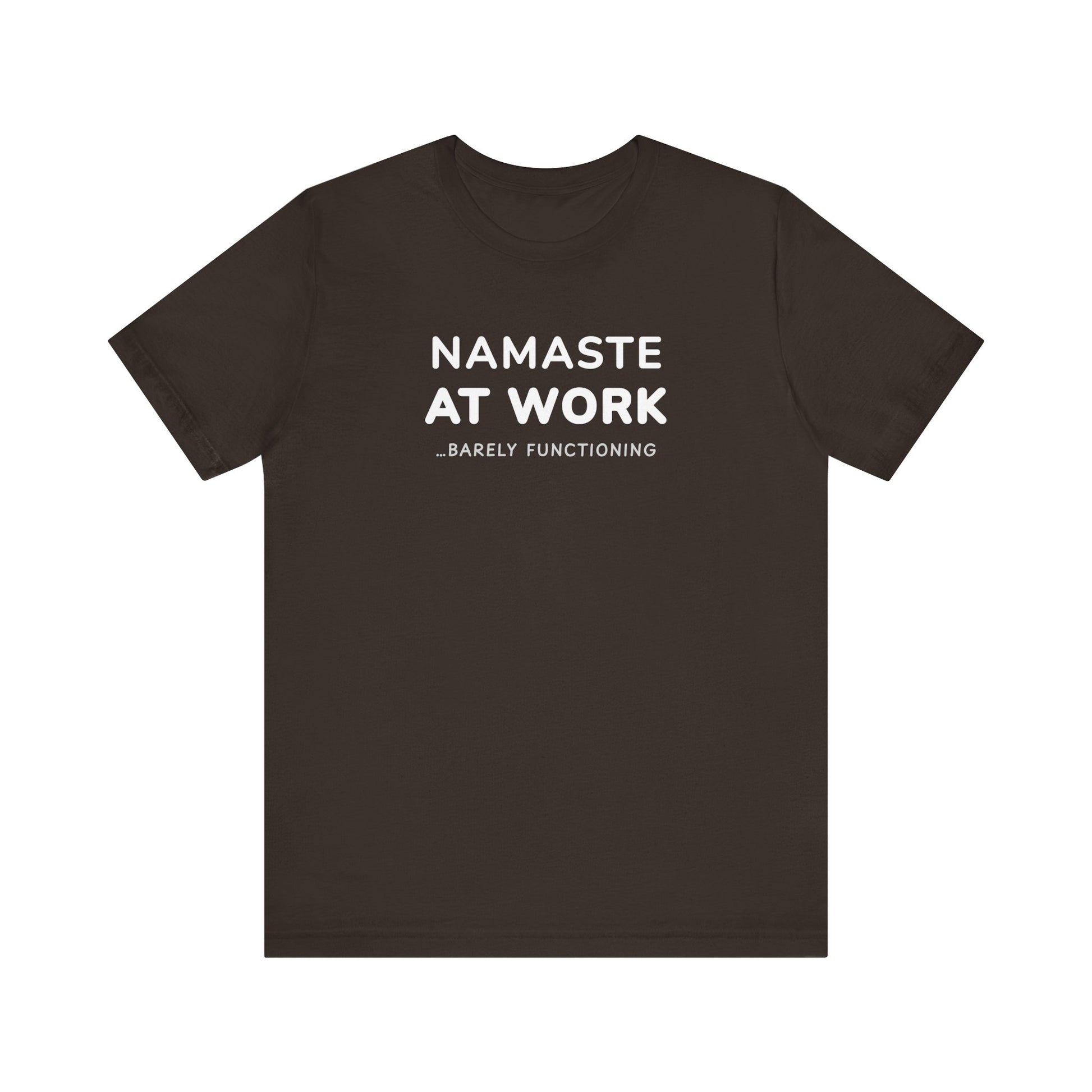Brown t-shirt with text 'Namaste at Work...Barely Functioning' on a white background