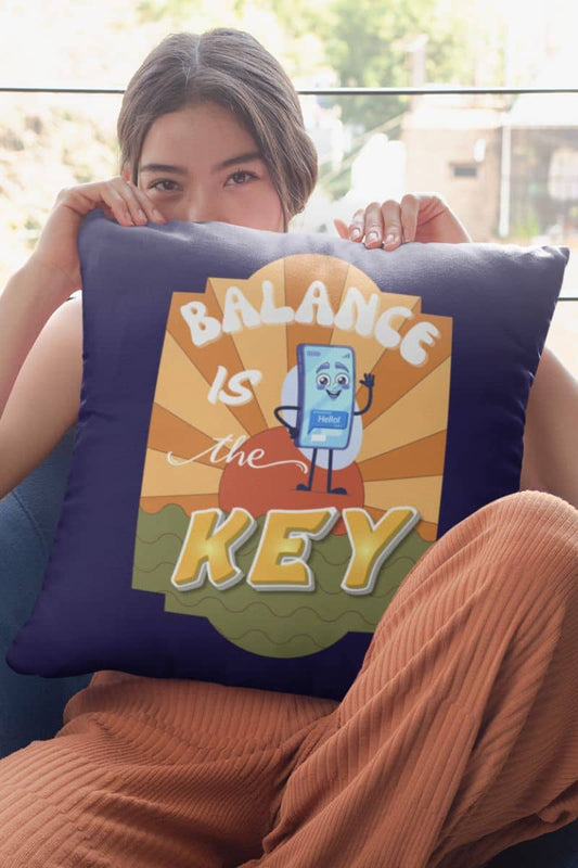 Balance is the key pillow with the girl sitting on the sofa hugging a square pillow covering half her face