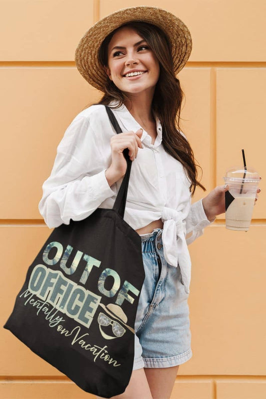 Beach tote bag with a girl walking down the street with a cup of milk tea in her hand
