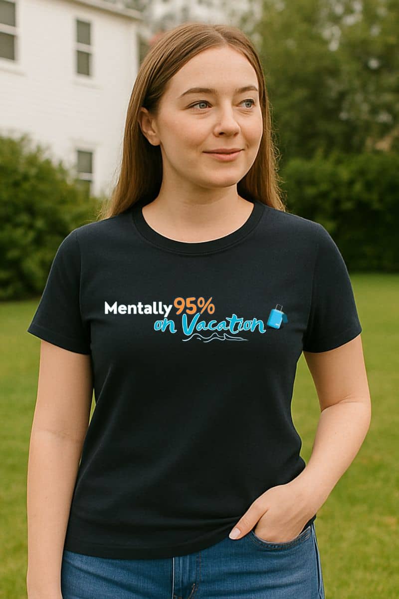 Beach vibes t-shirt with a person wearing a black t-shirt with text 'Mentally 95% on Vacation' outdoors