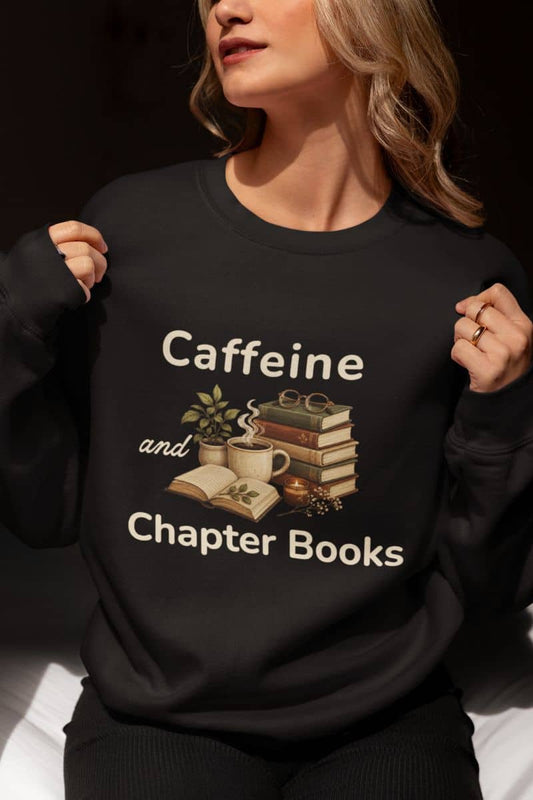 Book sweatshirts with a woman wearing a black crewneck sweatshirt with a graphic that reads 'Caffeine and Chapter Books'