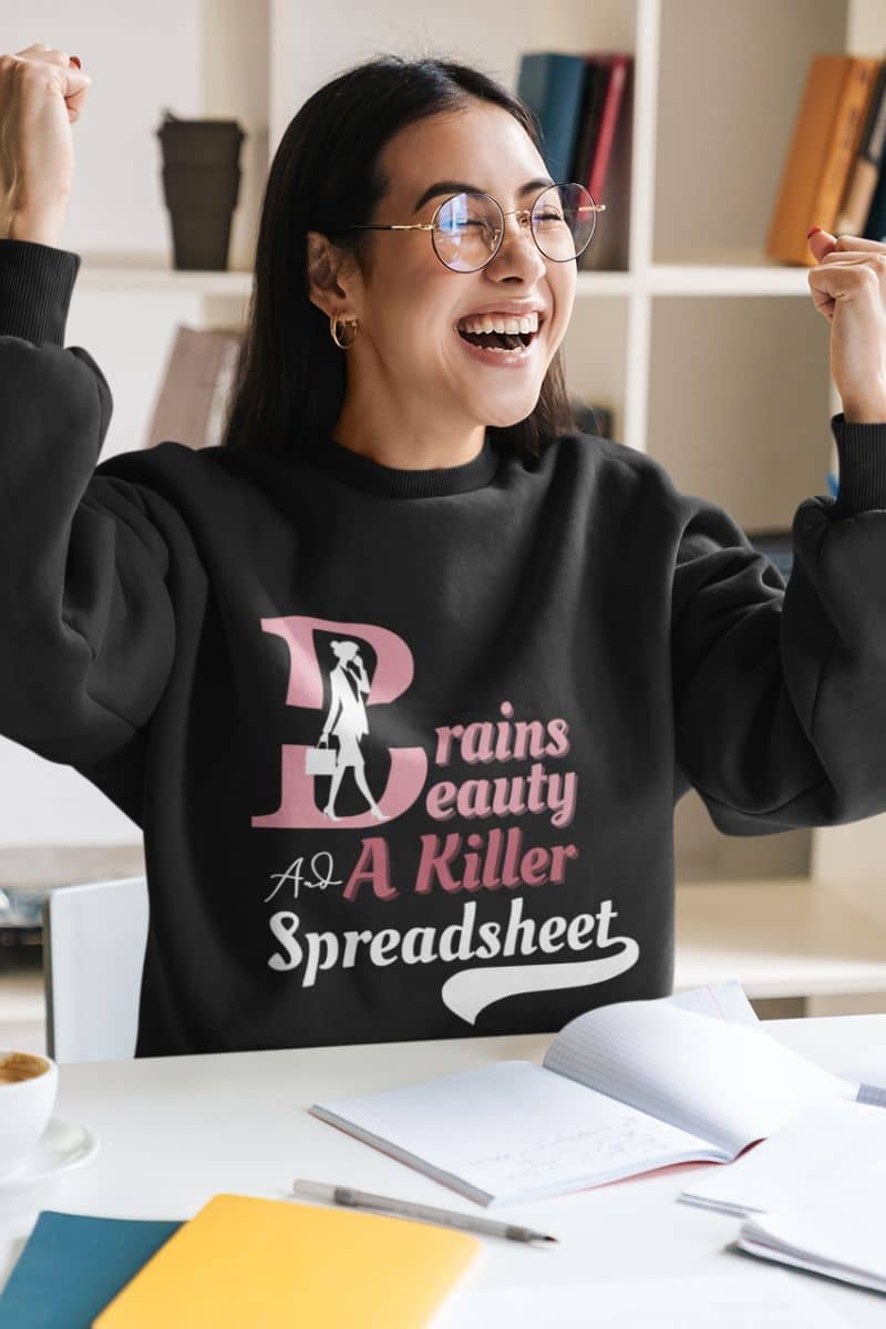 Boss babe sweatshirt with the young girl showing her happiness while studying with a bright smile