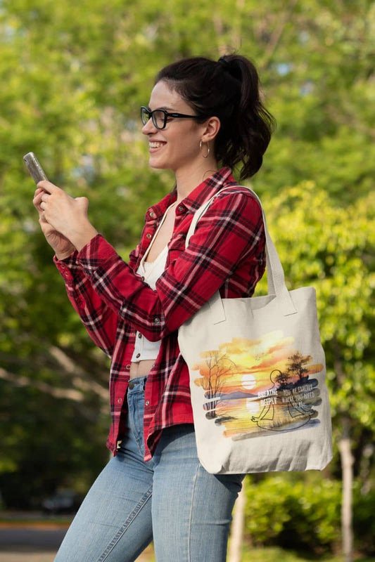 Breathe Deeply Tote Bag with a girl texting and smiling happily