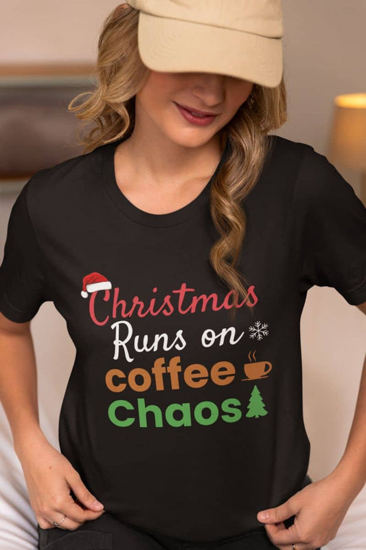 Christmas coffee lover shirt with a a person wearing a black t-shirt with text 'Christmas Runs on Coffee & Chaos'