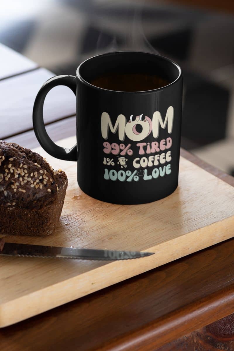 Coffee mug for moms with a knife, a loaf of bread and a cup of coffee on the cutting board