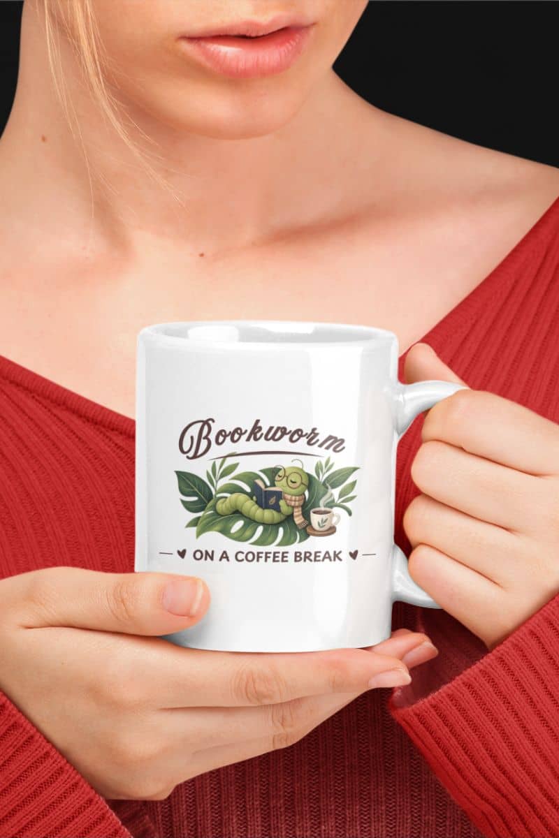 Coffee mug for readers with a woman holding a white ceramic mug with text 'Bookworm ON A COFFEE BREAK'.