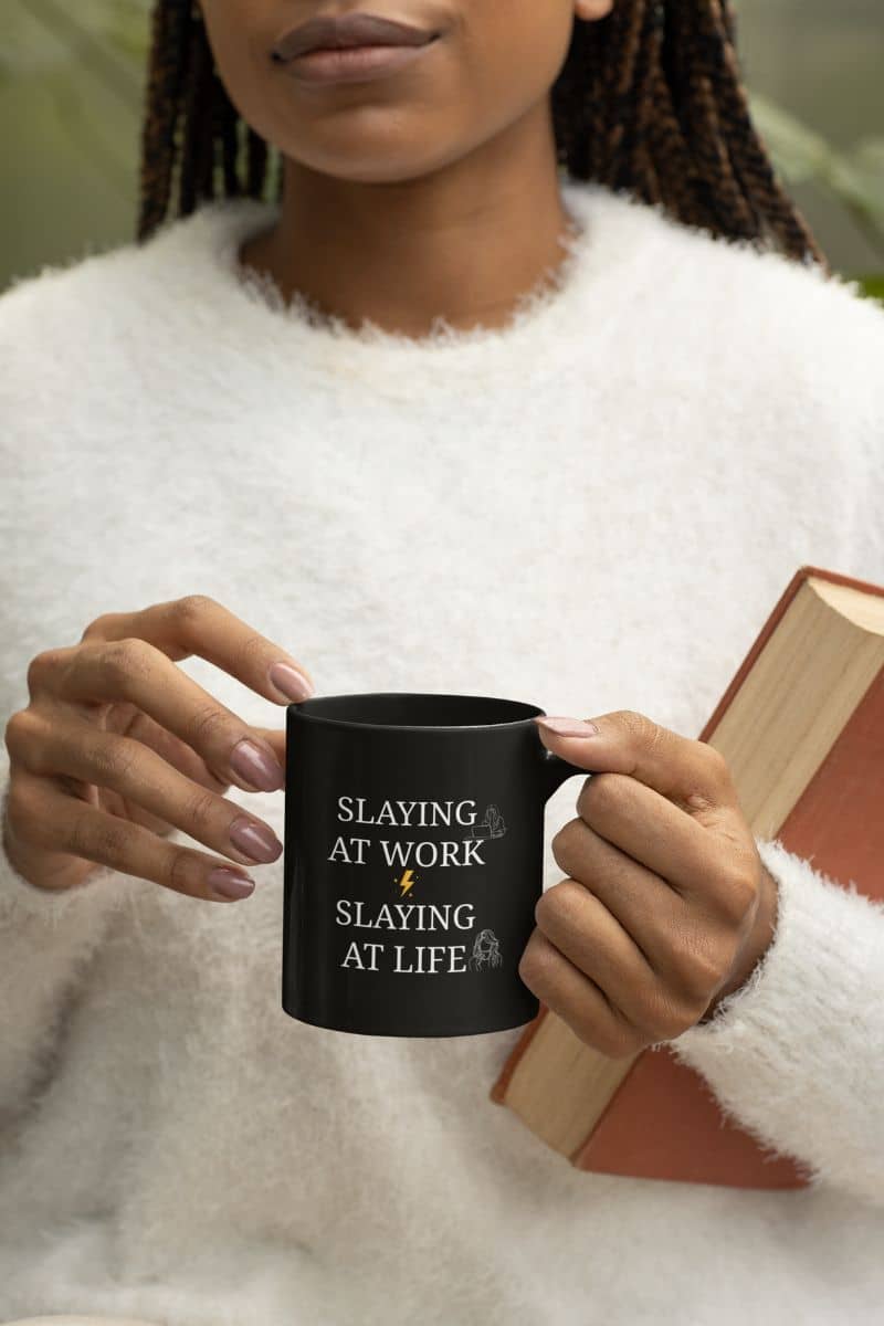 Confidence coffee cup with a black girl holding a book and a cup of coffee in her hand