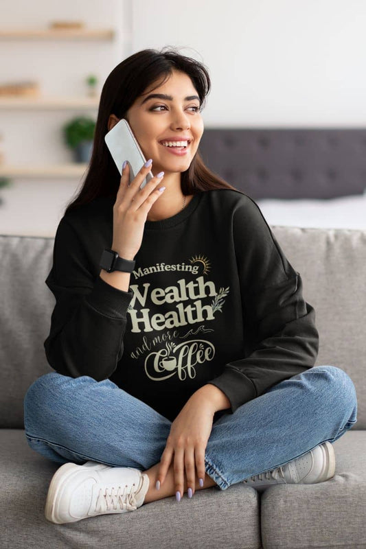 Cozy manifestation sweatshirt with a beautiful girl sitting on the sofa talking on the phone