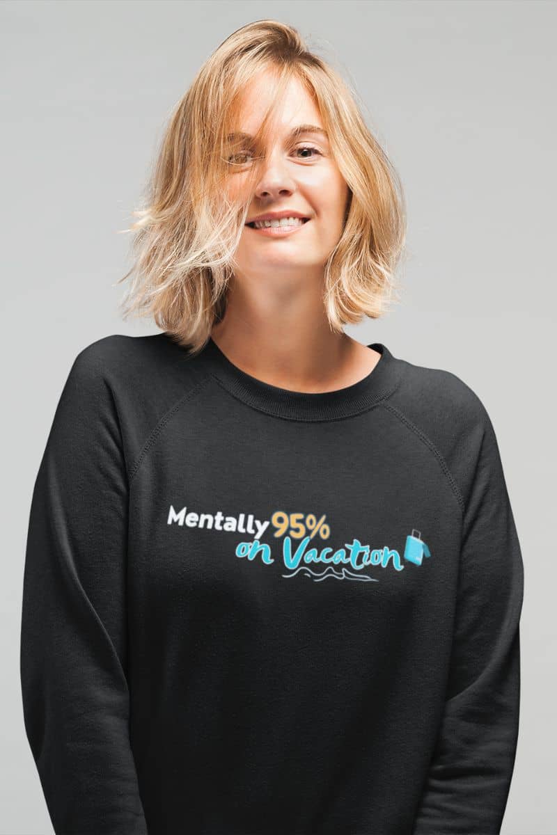 Cozy vacation pullover with a person wearing a black sweatshirt with text on a gray background