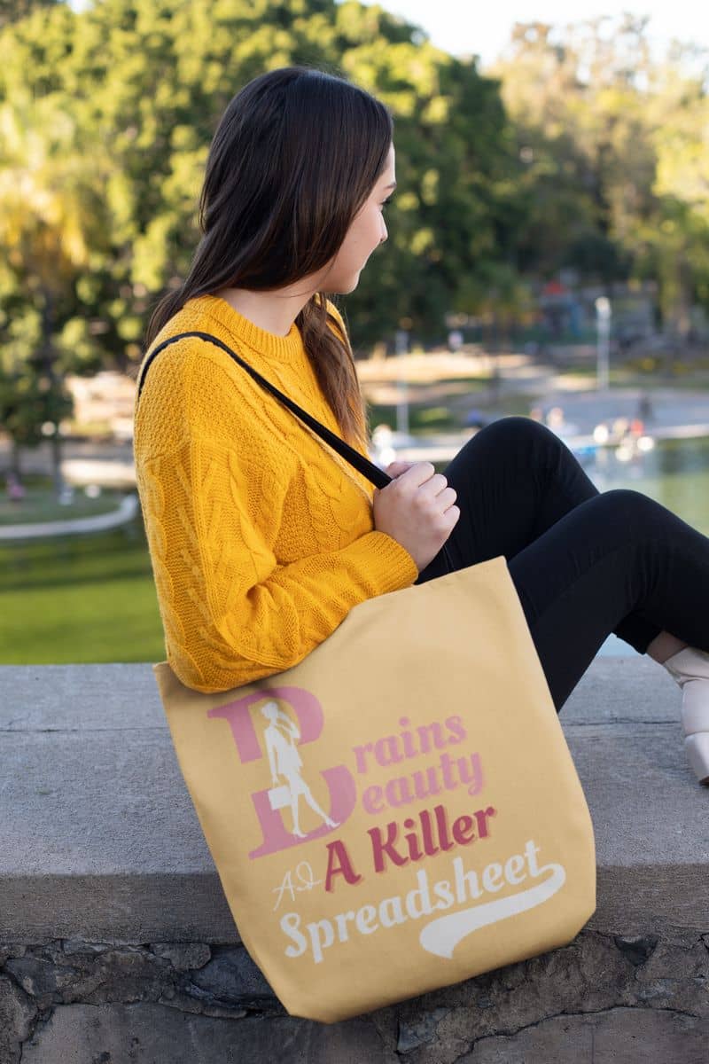 Empowered women tote bag with a girl sitting in the park