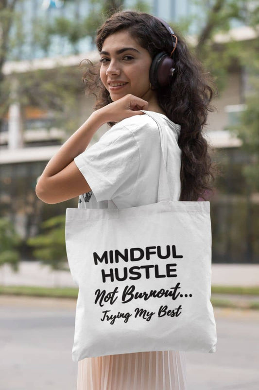 Everyday tote bag with a woman holding a tote bag with text 'Mindful Hustle Not Burnout... Trying My Best'.