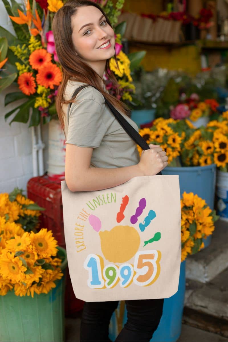 Explore the Unseen 1995 Tote Bag with young girl posing in front of flower shop
