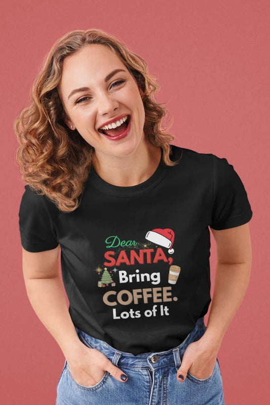 Funny Santa coffee shirt featuring a woman in black t-shirt with text 'Dear Santa, Bring Coffee. Lots of It.'