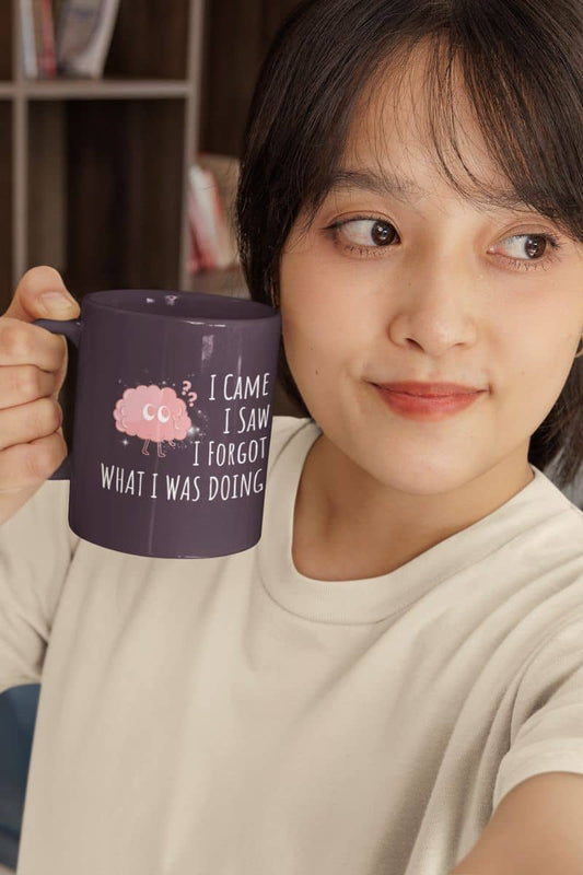 Funny coffee mug with a girl taking a selfie with a cup in the office