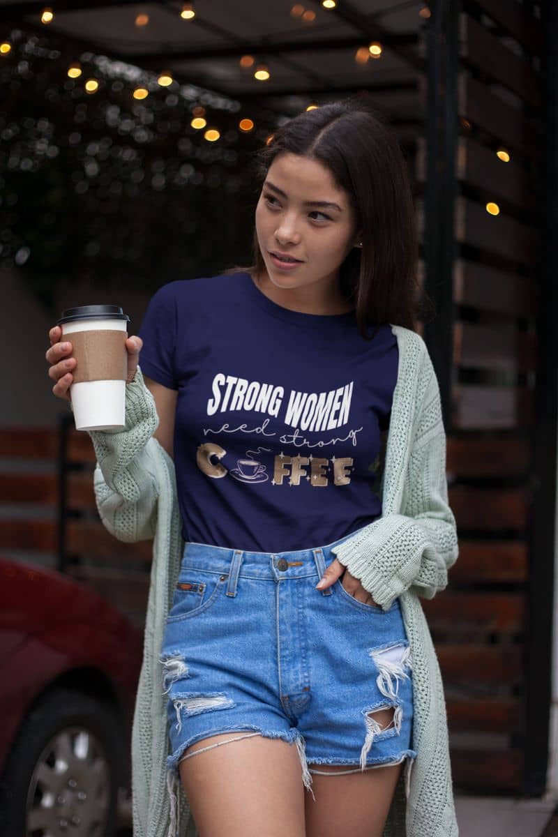 Funny coffee tshirt with girl wearing t-shirt and shorts standing posing with a cup of coffee in hand