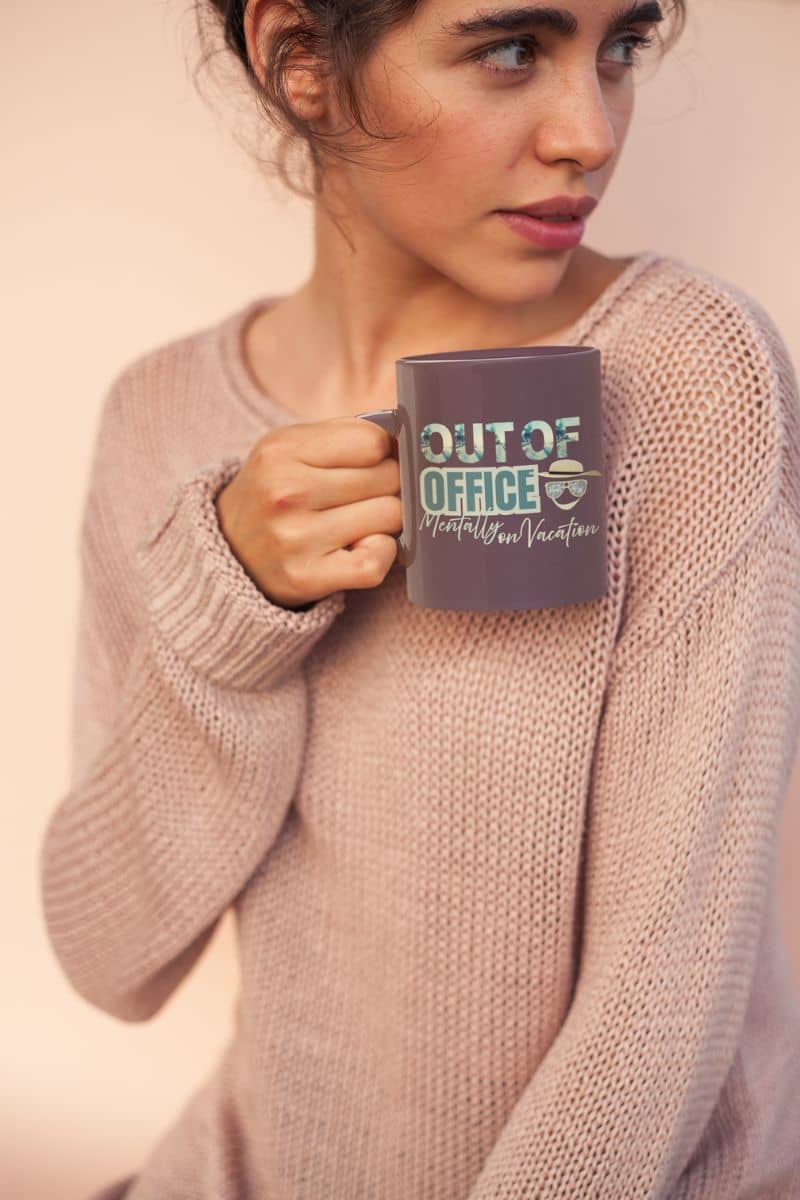 Funny office mug with a girl holding a cup of coffee looking in one direction