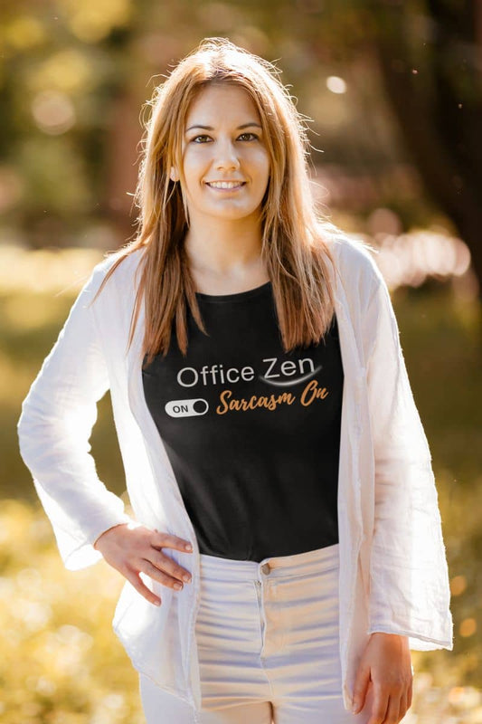 Funny zen t-shirt with a woman wearing a black t-shirt with 'Office Zen' text, standing outdoors.