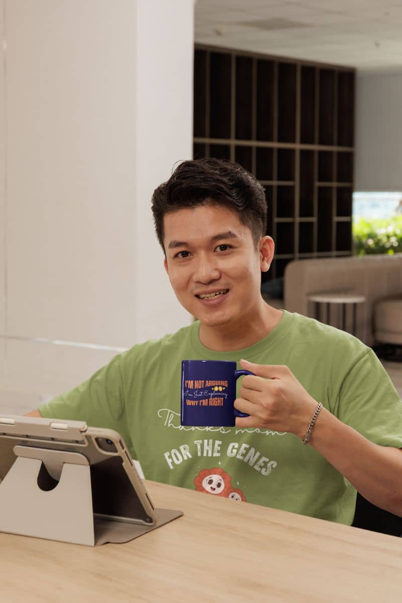 Hilarious coffee mug for work with a guy working at home on his tablet while holding a cup in his hand