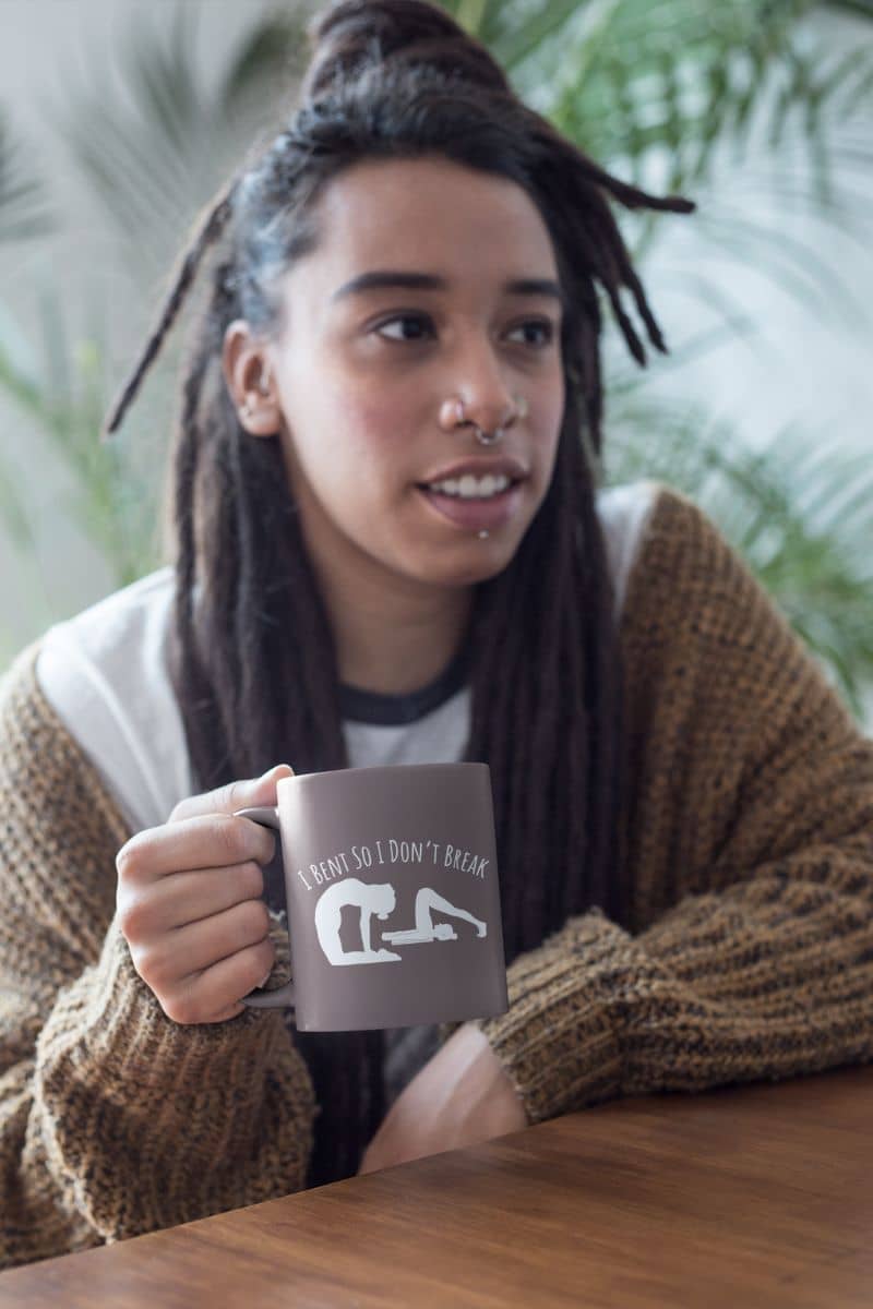 I bent so I don't break mug with a girl holding a cup and smiling