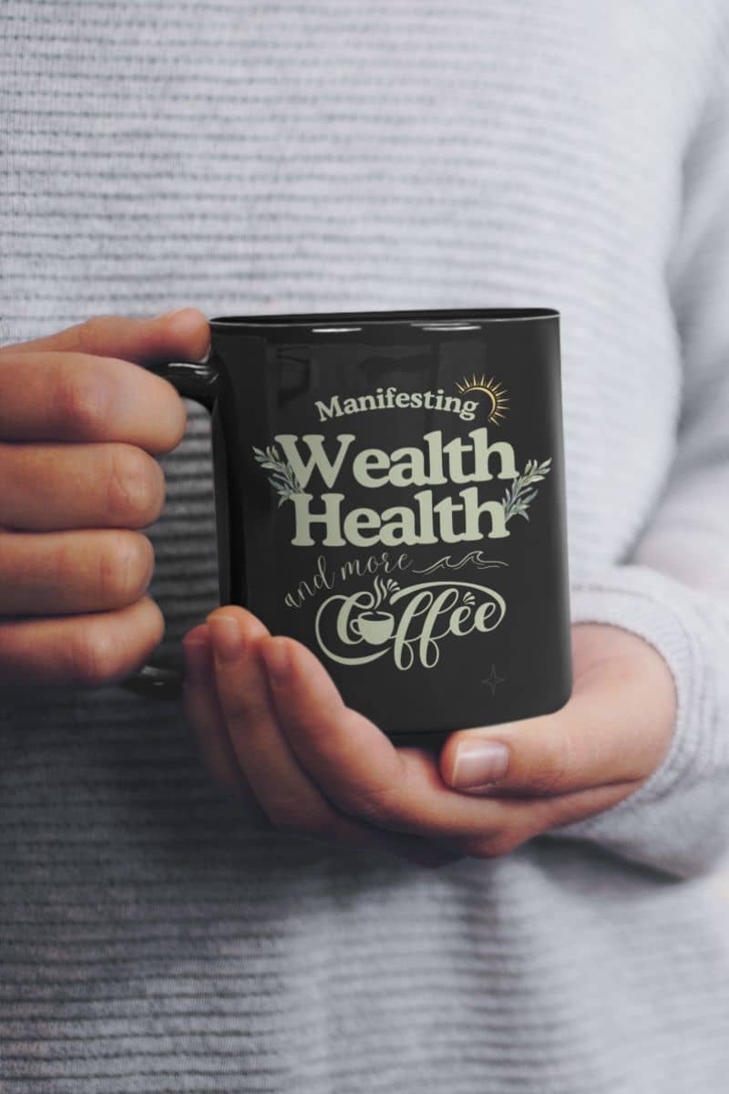 Inspirational coffee mug with a girl holding a cup of coffee in front of her chest