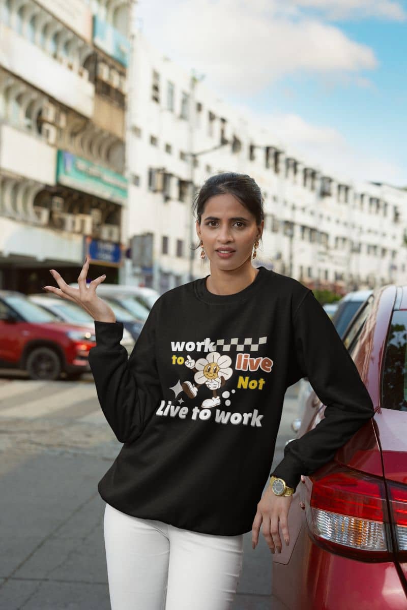 Inspirational sweatshirt with a girl leaning on the car posing in front of the apartment building