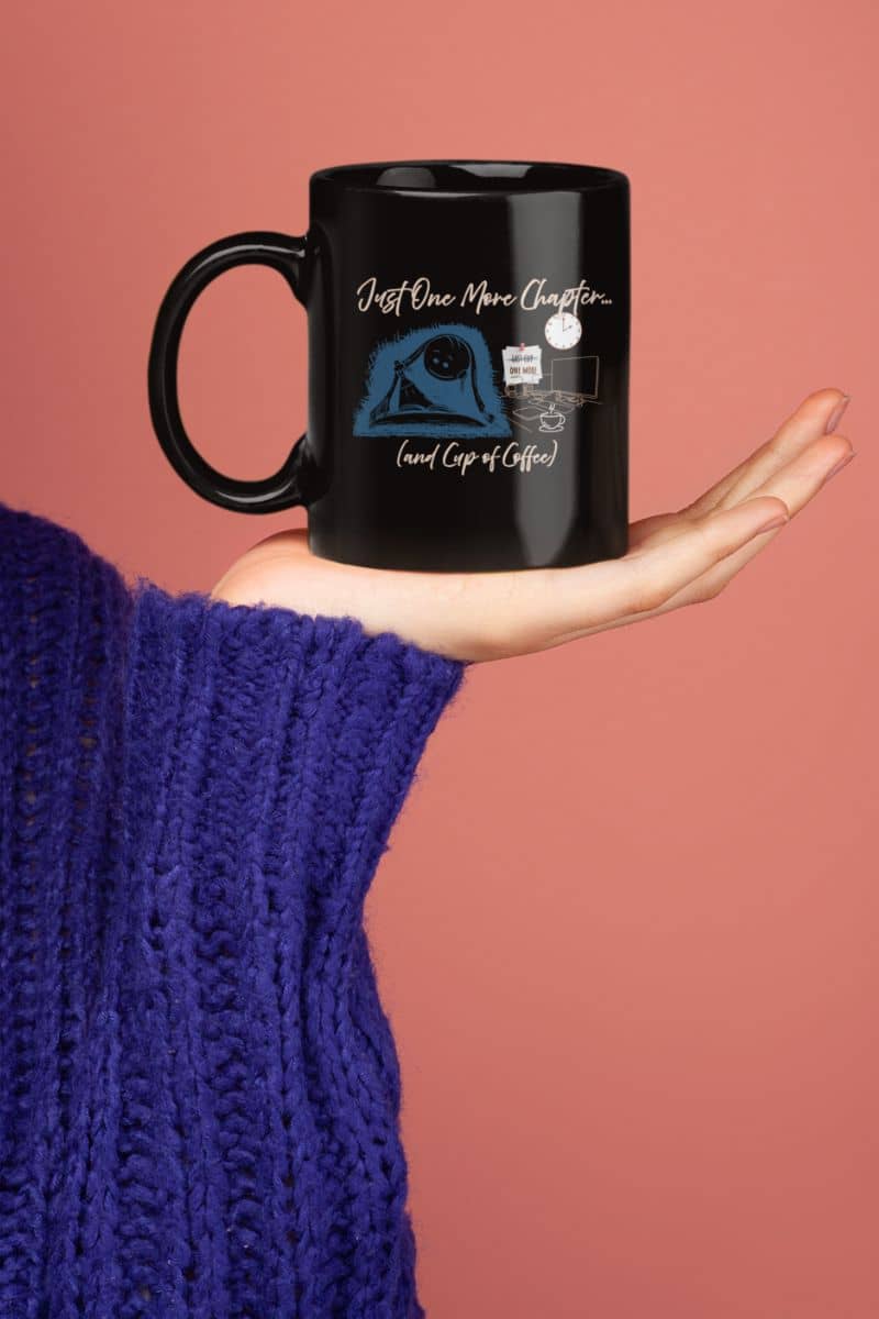 Just one more chapter coffee mug with a woman holding a cup in her palm