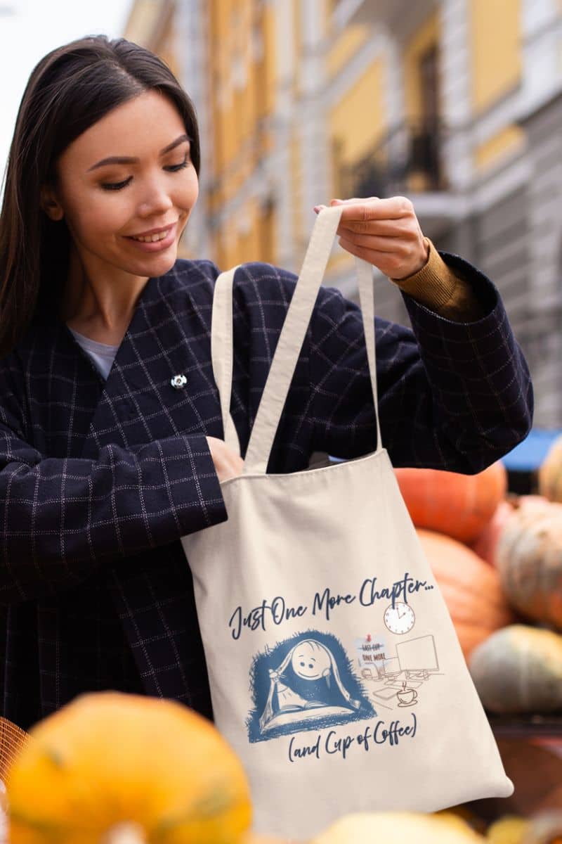 Just one more chapter tote bag with a girl shopping at a pumpkin shop