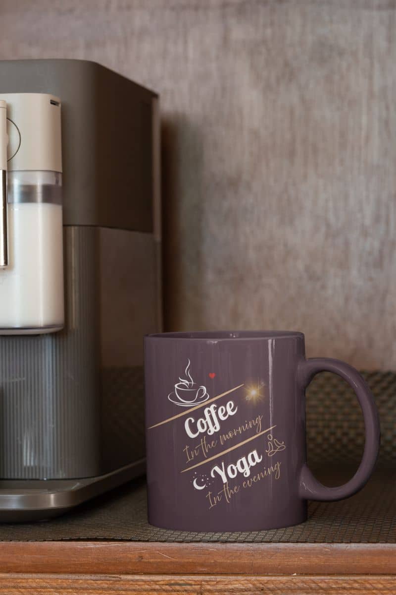Lifestyle mug with a cup of coffee next to the coffee maker
