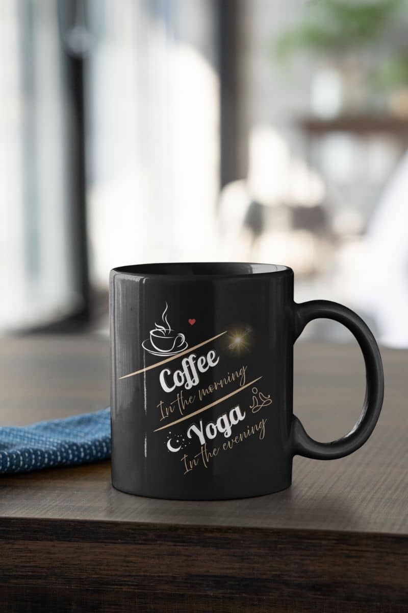 Lifestyle mug with a black cup on the wooden table
