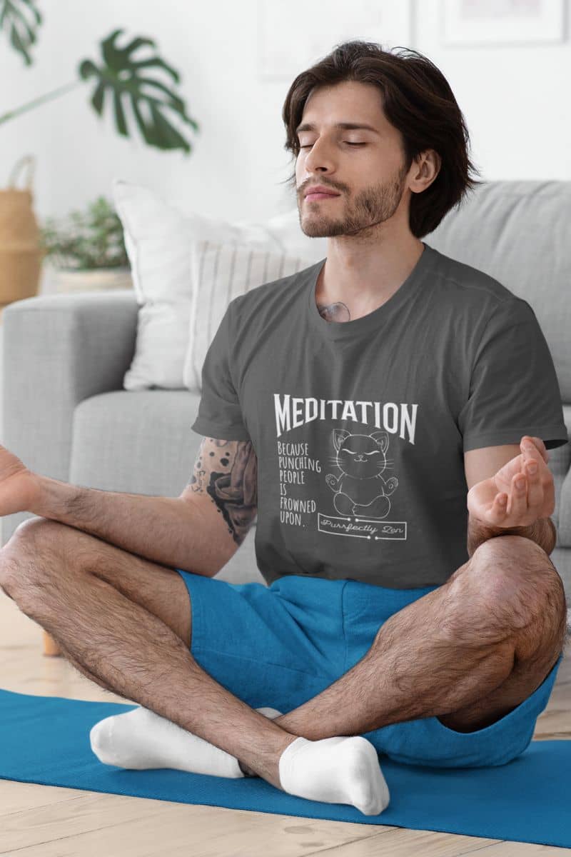 Meditation T-shirt: because punching people is frowned upon with a guy meditating on a yoga mat in front of the sofa