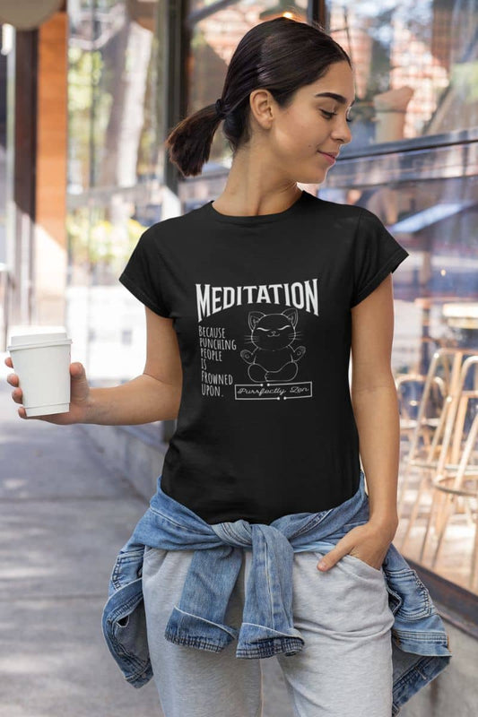 Meditation T-shirt: because punching people is frowned upon with a girl standing posing with one hand holding a cup of coffee and the other hand in her pocket