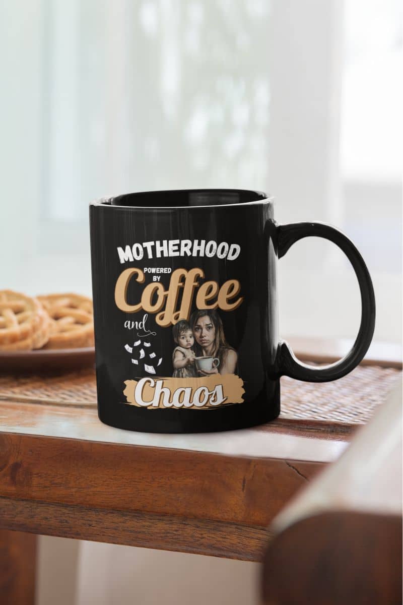 Mom fuel mug with a cup of coffee next to a plate of cookies