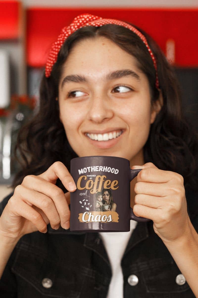 Mom fuel mug with a girl holding a cup of coffee in her hand with a bright smile