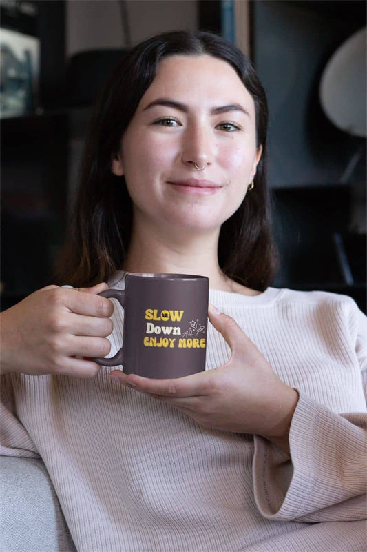 Motivational coffee mug with a girl smiling while holding a cup of coffee in her hand