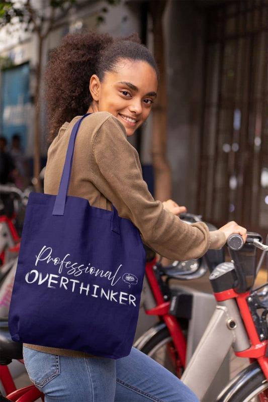 Overthinker tote bag with a girl going to school by bike