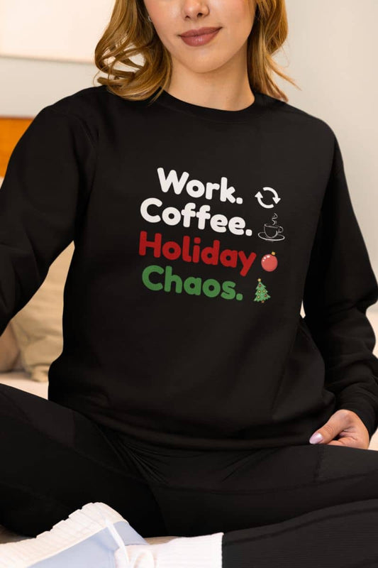 Overworked holiday sweatshirt with a person wearing a black sweatshirt with text 'Work. Coffee. Holiday Chaos.'