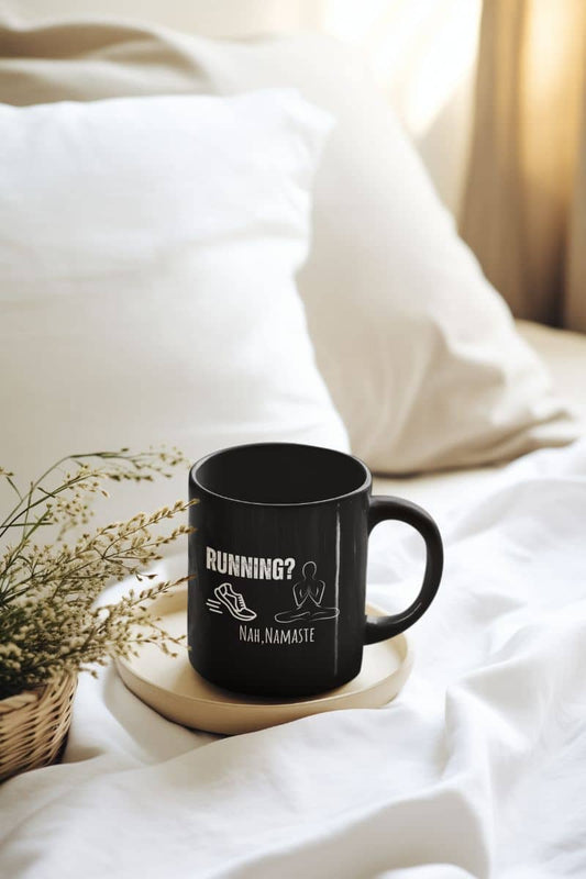 Relax and unwind yoga mug with a cup and a pot of dried flowers lying on the bed